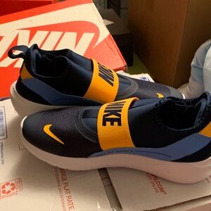 Nike Kids Slip-On Sneakers in Navy, Yellow and Light Blue